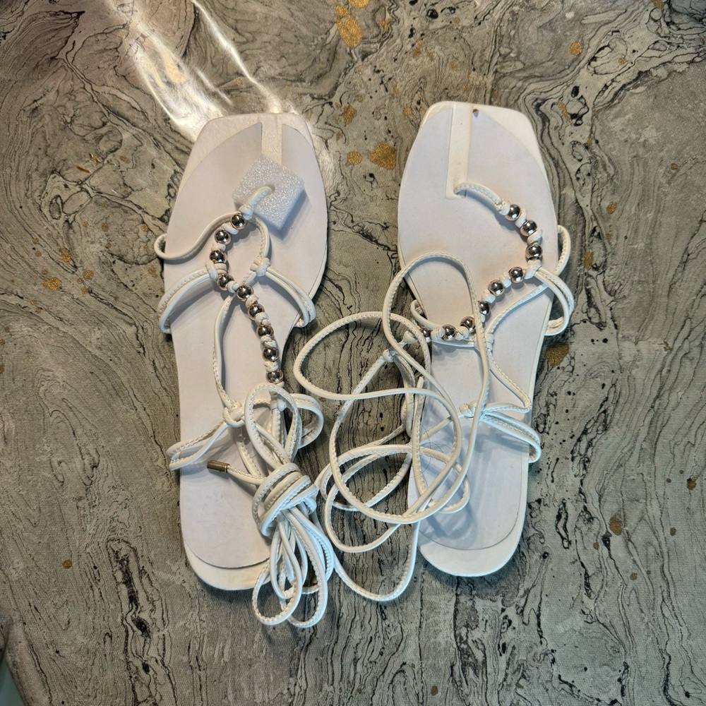 New Shein white sandals size 11
Tie around sandals